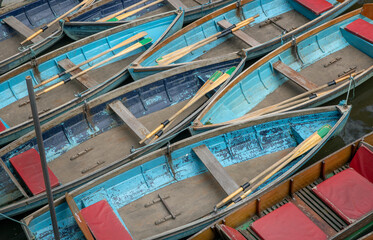 Fototapeta na wymiar Wooden rowing boats seen from above. Oxford. England. Punters. UK.