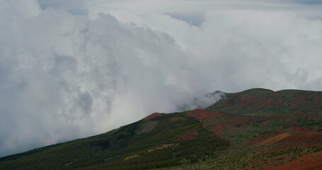 White clouds cover mountainside. Teide national park. Tenerife. Canary Islands.