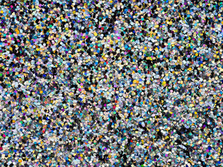 Fancy rainbow color glitter sparkle confetti background for happy birthday party invite card, Christmas, xmas holiday seasonal wallpaper decoration, greeting, wedding invitation card design element.