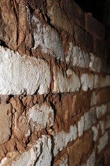 
old stone wall falling down