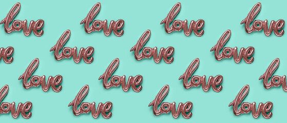 Balloon in shape of word LOVE on color background. Valentine's Day celebration