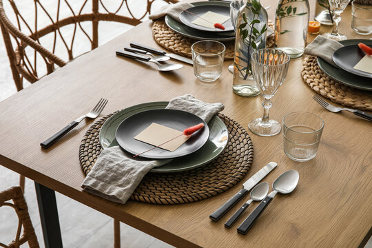 Beautiful table setting with natural decor in room