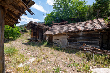 Obraz premium Grain warehouses Sinan Degirmeni in Doyran Village. It's estimated that the ancient Lycian region was inspired by the sarcophagi. There are 86 cereal warehouses in the region that can survive. Antalya