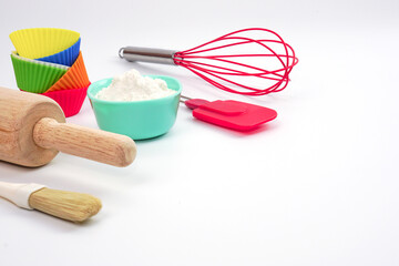 Top view set of kitchen utensils and ingredients for bakery on white background. Materials or kitchen equipment for bakery.