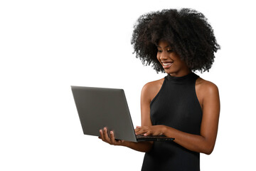 Obraz na płótnie Canvas black woman holding a computer while looking and smiling at the computer screen