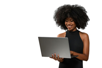 Fototapeta na wymiar black woman holding a computer while looking and smiling at the computer screen