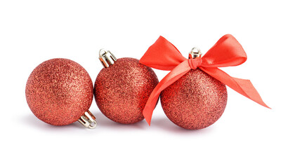 Shiny Christmas balls with bow on white background