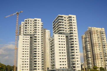 Fototapeta na wymiar real estate in israel. Beautiful new buildings, apartment buildings. Modern housing. Concept: investment, loan, mortgage, rent, sale