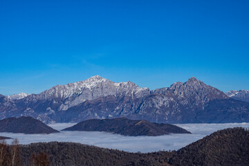 Clouds on the valley floor of Lake Como and Brianza viewed from Mount Puscio