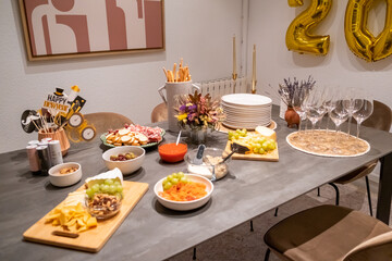 Decorated New Year's table with golden candles