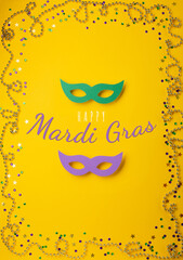 Mardi Gras gold color beads with Masquerade festival carnival masks and golden, green, purple...