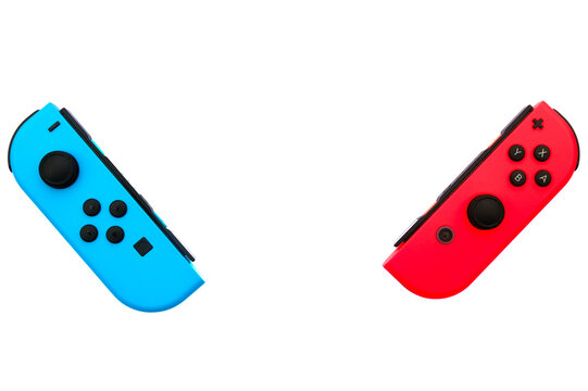 "Kuala Lumpur, Malaysia- Circa January, 2022: A flatlay picture of Nintendo Switch controller been split on copyspace white background."