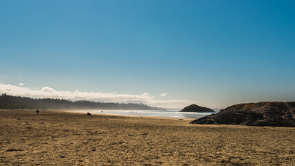 sand beach over the Pacific Ocean along the Vancouver Island coastline, British Columbia, Canada