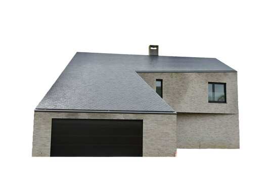 Facade of a house with strange architecture having a slight asymmetry on a white background.