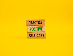 Practice Positive Self-care symbol. Concept words Practice Positive Self-care on wooden blocks. Beautiful yellow background. Business and Practice Positive Self-care concept. Copy space