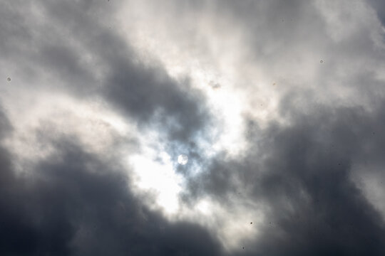 Different shots of crazy clouds covering the sun