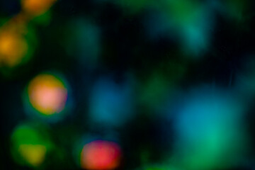 abstract dark background with colored spots