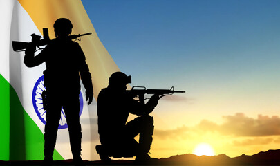 Silhouette of soldiers with India flag on a background the sunset. EPS10 vector