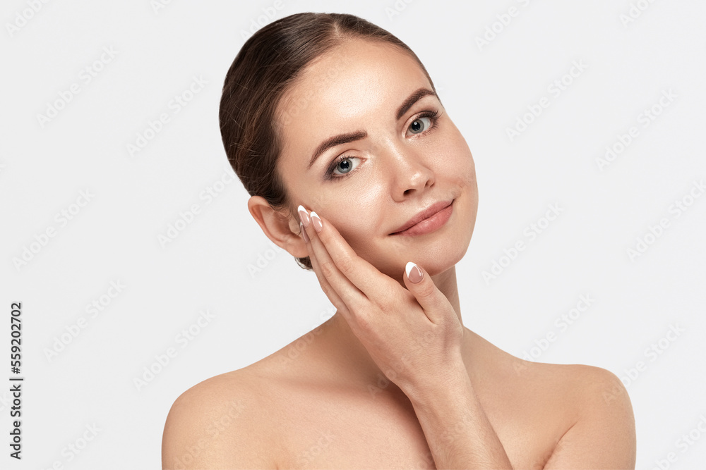 Poster beautiful young woman with clean fresh skin touch own face . smiling girl model with natural makeup,