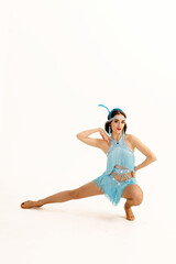 A girl dancer in Gatsby-style costumes