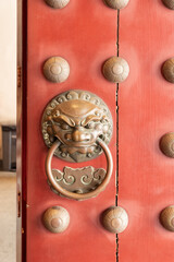 Singapore, Singapore - 01 July 2022: door knocker in hindu temple - 559213520