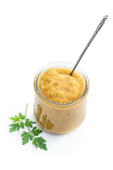 Vegetable puree in a glass jar isolated on white