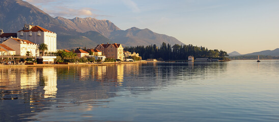 Obraz premium Beautiful winter Mediterranean landscape. Montenegro. View of Bay of Kotor and embankment of Tivat city