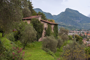 Fototapeta na wymiar Old farmhouse on Strada Santa Maria Maddalena, above Riva del Garda, Trento, nouthern Italy