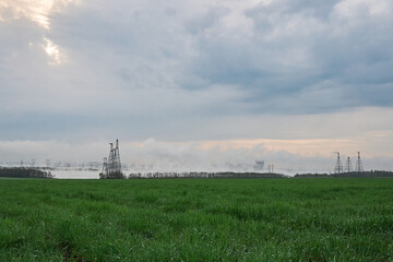 Fototapeta na wymiar View of the South Ukrainian nuclear power plant in Ukraine during heavy fog
