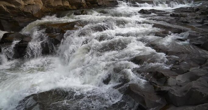 Rapids on the river, waterfall. Cinema 4K 60fps video