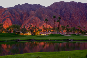 La Quinta mountains reflected in lake