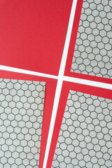 scrapbook paper sheets with pattern: honeycomb and red card stock 