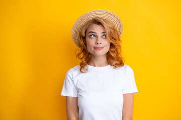Redhead young beautiful funny woman in straw hat. Summer mood. Portrait of young smiling cheerful caucasian pretty gild ginger hair.