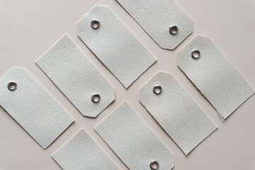 set of cotton duck tags with re-enforced metal rivets