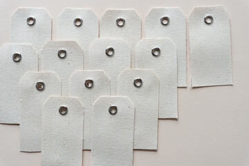 set of cotton duck tags with re-enforced metal rivets