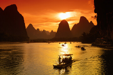 traditional boats to transport tourists along the Li River near Guillin