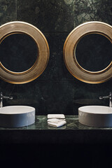 Interior image of double sink bathroom in hotel