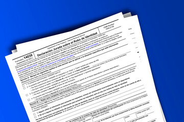 Obraz premium Form 14039 (sp) documentation published IRS USA 44205. American tax document on colored