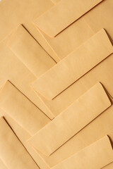 kraft paper envelopes arranged in herringbone pattern