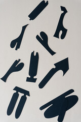 set of cut paper shapes on blank paper