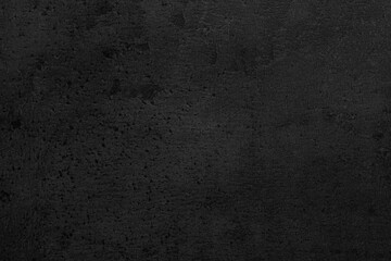 Texture of black stone surface as background, closeup