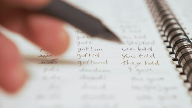 Language Learning Reading Persian (Farsi) from notebook