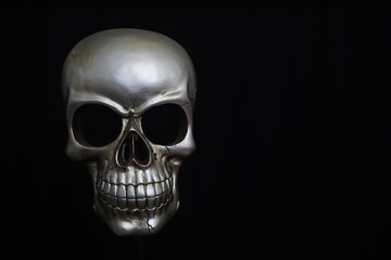 human skull on black background warning danger death Halloween theme