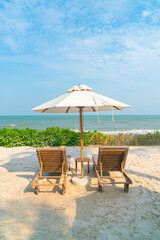 umbrella with beach chair and ocean sea background