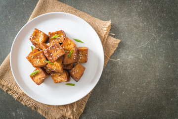 fried tofu with white sesame and teriyaki sauce