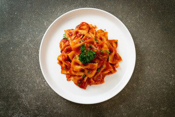 farfalle pasta in tomato sauce with parsley