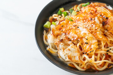 ramen noodles with gyoza or pork dumplings