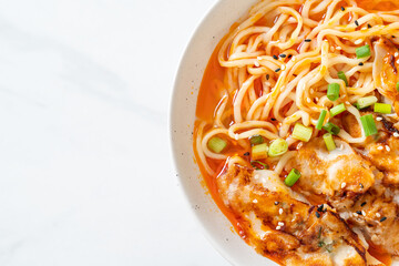 ramen noodles with gyoza or pork dumplings