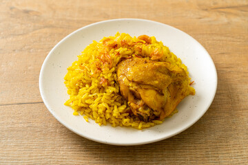 Chicken Biryani or Curried rice and chicken - Thai-Muslim version of Indian biryani, with fragrant yellow rice and chicken