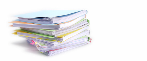 Pile or heap of financial business document paperwork stack on office desk concept of workload overtime or workplace paperless copy